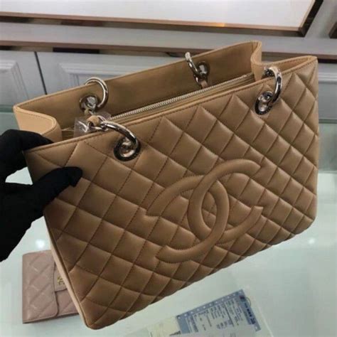 farfetch chanel bolsas.